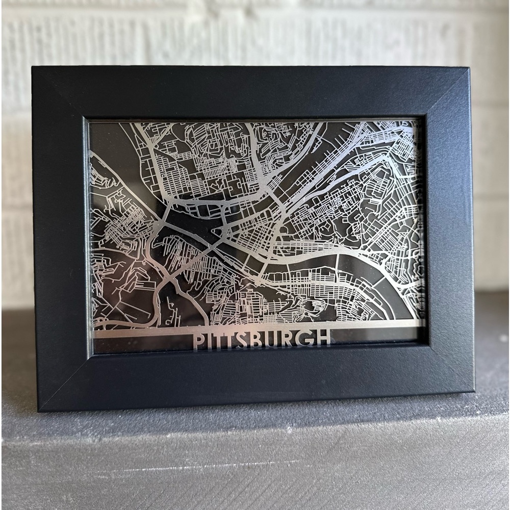 Stainless steel framed map of Pittsburgh, PA. 4.5”x 8.5” Black frame.